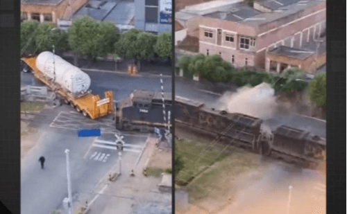 Trem bate em carreta parada sobre trilhos; veja o vídeo